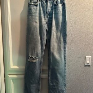 H&M light wash jeans. Size 6. Slightly distressed. NWT